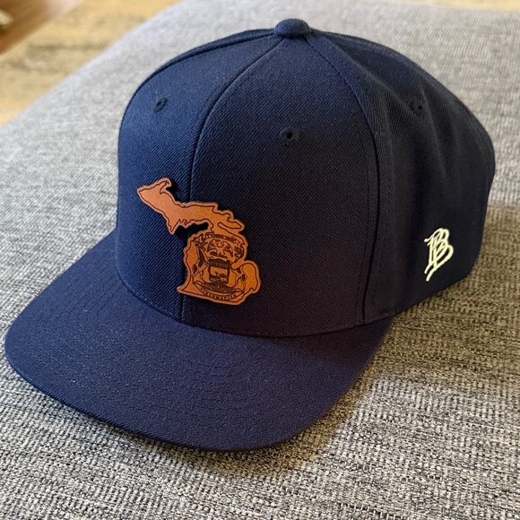 Classic Navy Cap with Brown Emblem - Picture 1 of 5